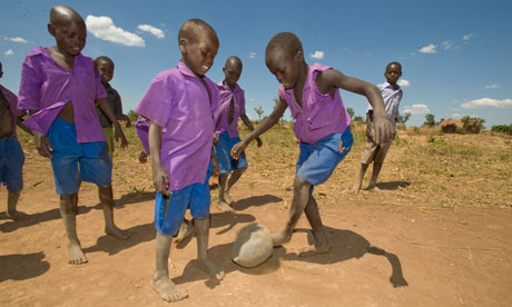 Children Playing Football In Africa